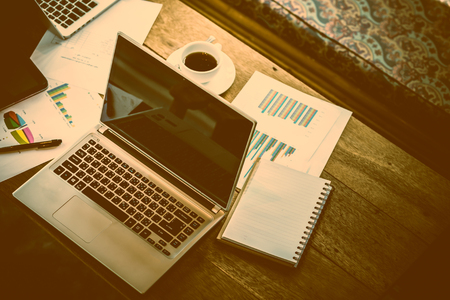 business item for meeting on wooden table in coffee shop, nobodyの写真素材