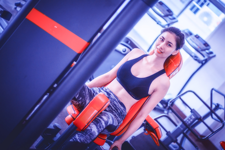 asia woman doing exercise in fitness gymの写真素材
