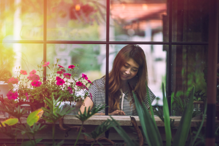 portrait of asia beautiful woman relax in coffee shopの写真素材