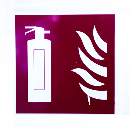 Fire extinguisher sign on the wall