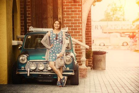 portrait of asia beautiful woman with vintage carのeditorial素材