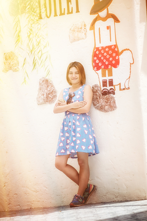 portrait of asia Attractive young woman standing by wallのeditorial素材