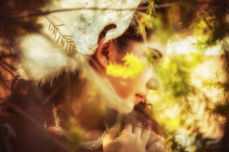 close up of asia beautiful young woman posing in forestの写真素材