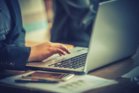 young business woman using laptop in officeの写真素材