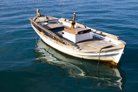 A wooden old fishing boatの写真素材