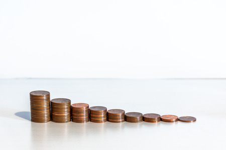 Coin stacks on a white background