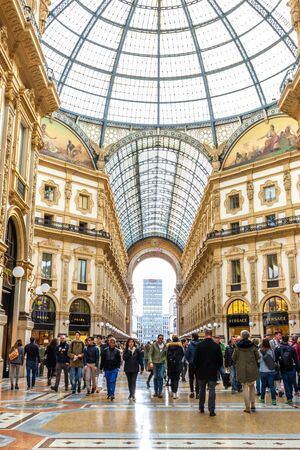 People goes shopping in the oldest shopping mall, Galleria Vittorio Emanuele II, Milan, Italyのeditorial素材