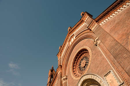 Detail of the facade of the Basilica of the Assumption of the Blessed Virgin Mary in Bologna, Italyの写真素材