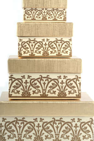 Decorative golden boxes on whiteの写真素材