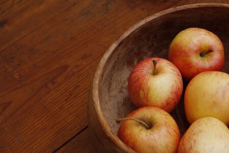 Apples in a Wooden Bowlの写真素材