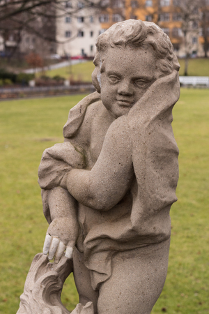 Portrait of a statue of a boy draped in a cloth in the Public Koernerpark in Berlin Neukoell (ca 1914)のeditorial素材