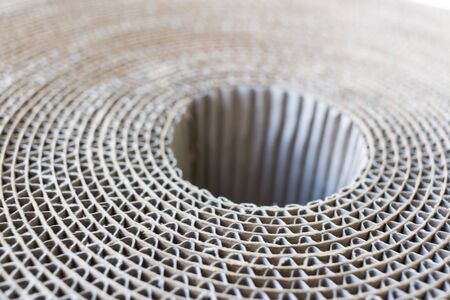 Top-down view of rolled up cardboard at an angleの写真素材