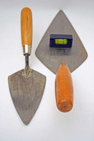 Two trowels and a spirit level.の写真素材