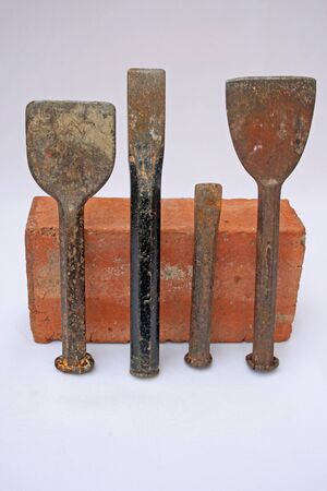 chisels and a birck.