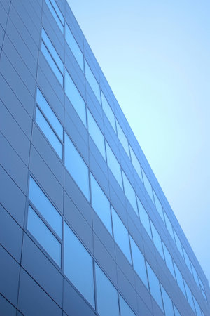 Modern building elevation on the background of a sky.