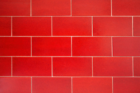 Texture of red tiles with a brigh-like pattern.の写真素材