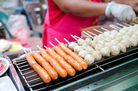 Grilled sliced sausages, tasty picnic food, barbecueの写真素材