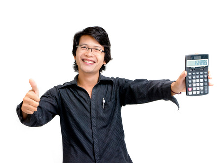 Smile asian business man showing calculatorの写真素材
