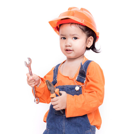 Asian Engineer baby with tools in hand Isolated on white backgroundの写真素材