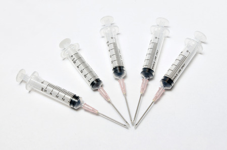 Close-up of medical syringe in rowの写真素材
