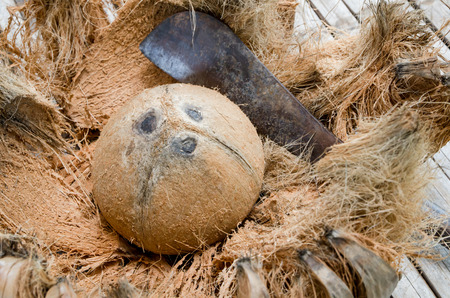 Peeled coconut on bamboo tableの写真素材