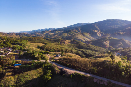 Drone shot aerial view landscape of mountain and nature against blue sky