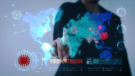 Business woman pointing on HUD, with virus outbreak words hologram futuristic globe sphere, technology conceptの写真素材
