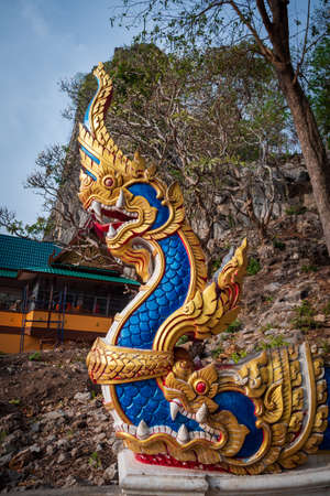Beautiful serpent sculpture cement art with colorful