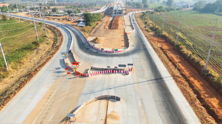 Drone shot aerial view of high angle view of a construction site building intersection across the...