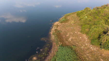 Aerial view of the reservoir dam and forest at rural countrysideの写真素材