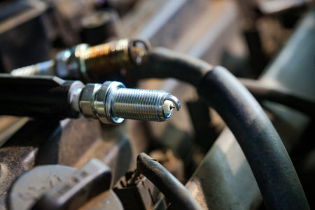 The spark plugs for gasoline engines are new and efficient, resulting in complete combustion in the engine, no soot and dirt Changing spark plugs can maintain and extend the life of the engineの写真素材