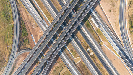 Drone shot aerial view of high angle view of intersection across the bridge against the countryside...