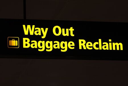 Way out baggage reclaim sign at an airportの写真素材