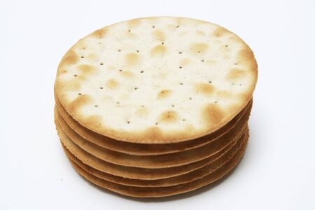 stack of cheese crackers isolatedの写真素材