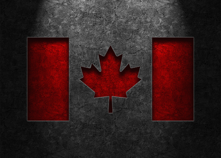 Flag of Canada rendered in a smooth, dark, weathered stone texture with lighting from top center.の写真素材