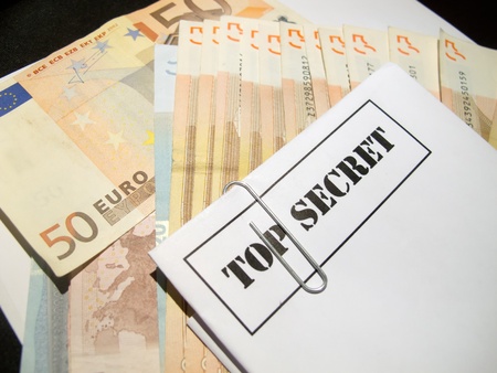 top secret envelope on top of fifty euro billsの写真素材