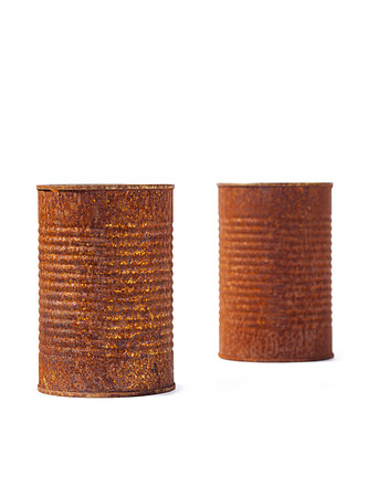 Rust tin cans isolated on white background の写真素材