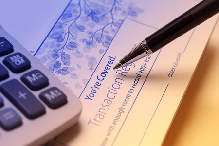 Check Register  A check register is your personal record of your checking account, helps you stay on top of transactions in your account, identify mistakes, catch identity theft, avoid bounced checksの写真素材