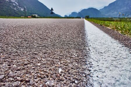 black asphalt mountain road  through the mountainsの写真素材