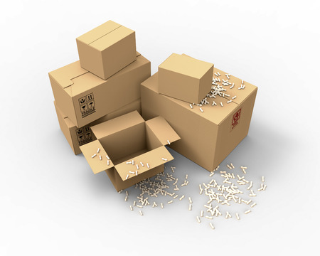 Multiple brown cardboard packing boxes in a variety of sizes stacked on on top of the other in a pile for storage, packaging for mail or removalsの写真素材