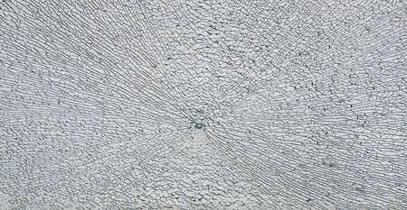 broken safety glass on white background.