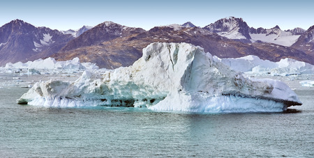 iceberg floating in greenland fjord.の写真素材