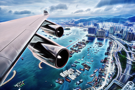 view out of an airplane window over hong kong.