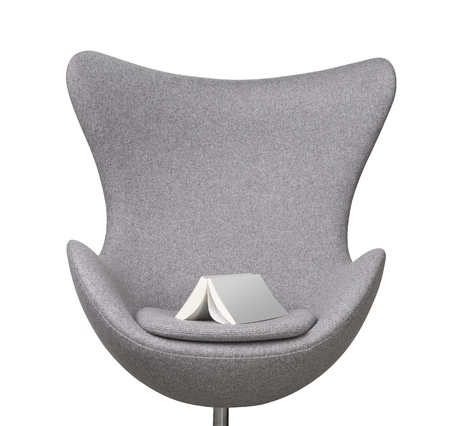 blank book on gray modern chair isolatedの写真素材