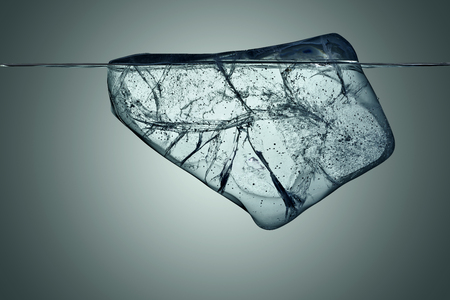 block of ice with underwater view with clipping pathの写真素材