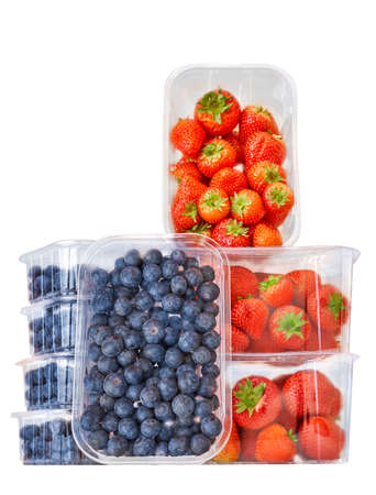 Bleuberries and strawberries in a studio setting, isolated on white.の写真素材