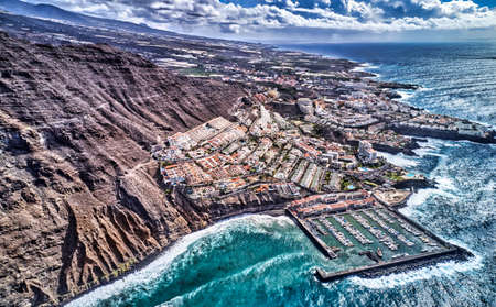 A Tenerife city coastline with rock formation., wide angle view of the sea.の写真素材