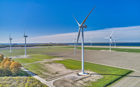 Wind Turbines with Blue Sky and Clouds shot in the Netherlands.