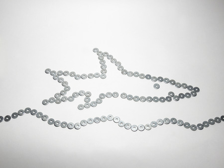 the symbol of the fish on waves. handmadeの写真素材