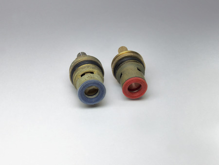 Two ceramic shut-off valves for hot and cold waterの写真素材